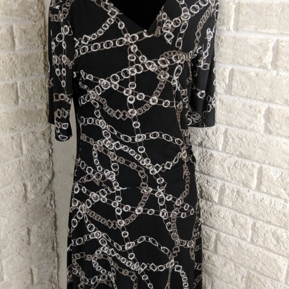 Daisy Fuentes Dresses & Skirts - Daisy Fuentes Black Faux Wrap Career Dress